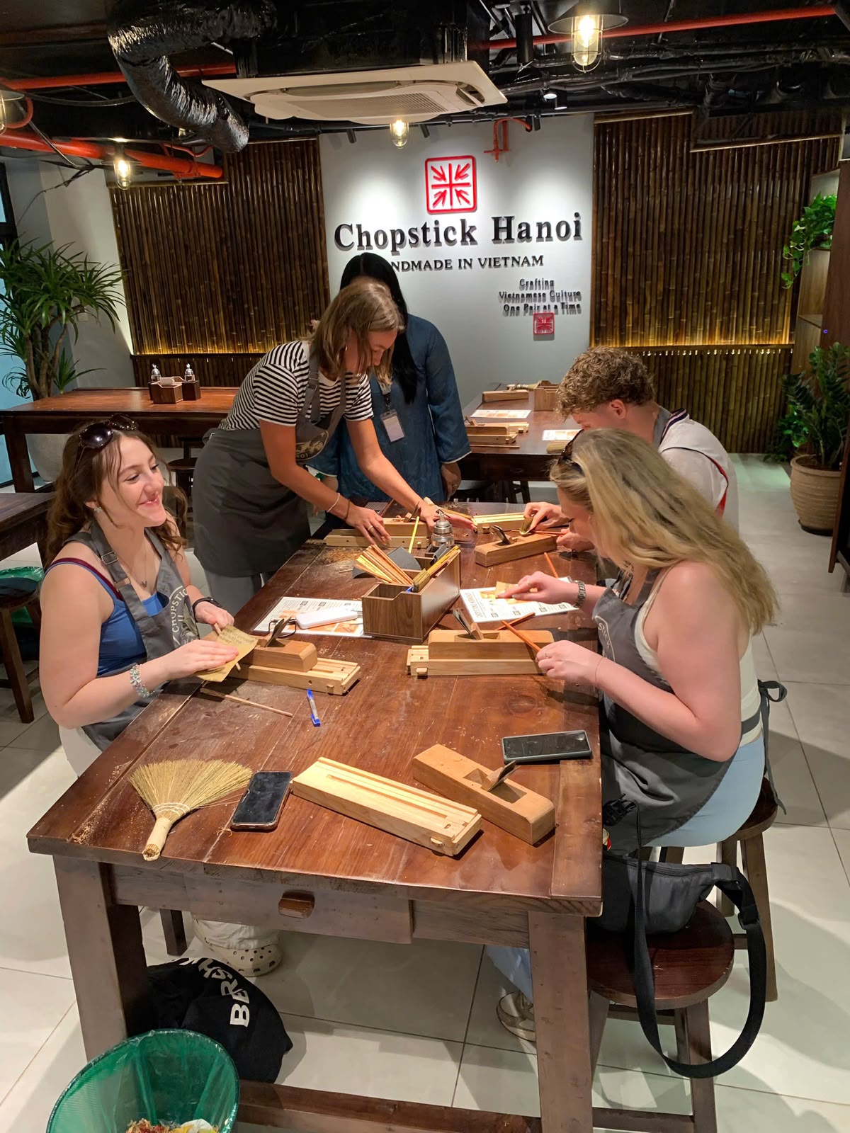 Guests enjoying the hands-on Chopstick Hanoi workshop