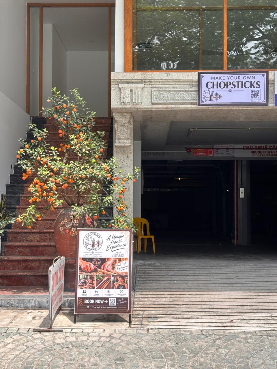 The Chopstick Hanoi entrance and street signs on Truc Bach