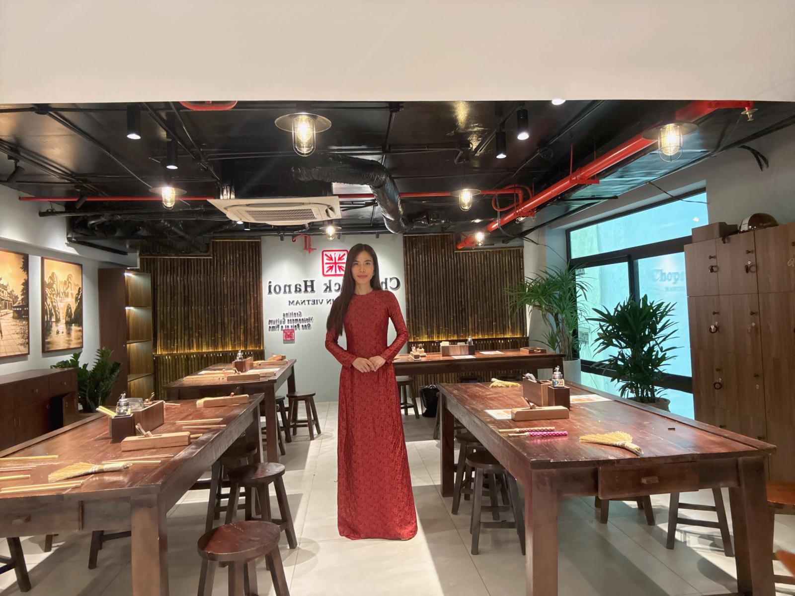 Thuy Nguyen standing inside the Chopstick Hanoi workshop